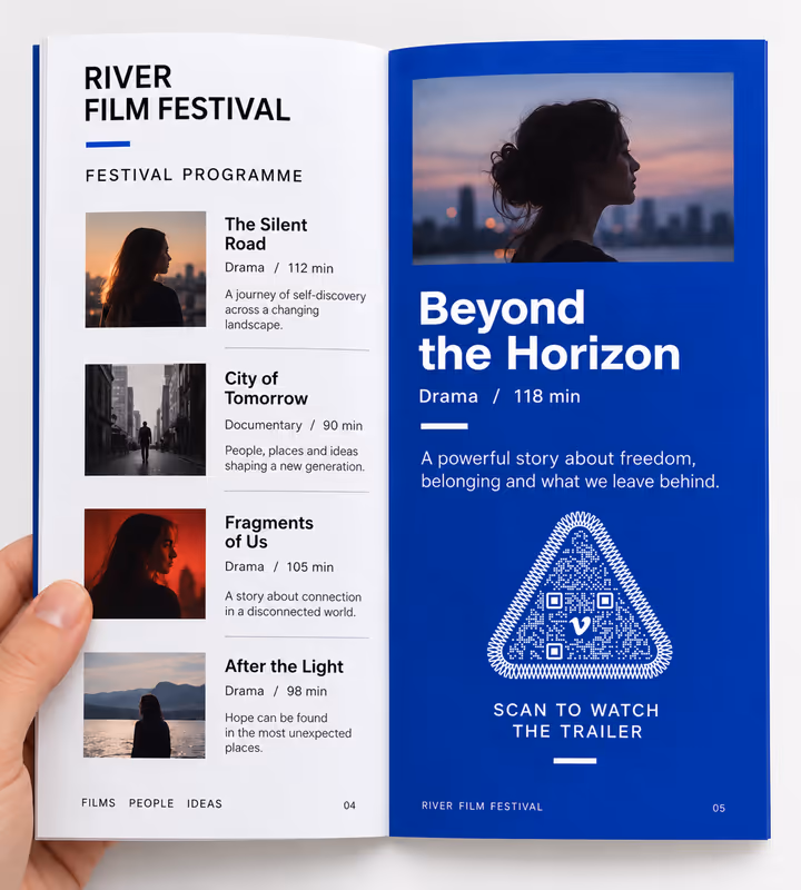 An open film festival programme with a blue page for “Beyond the Horizon” carrying a triangular QR code and “Scan to watch the trailer”, held open in one hand
