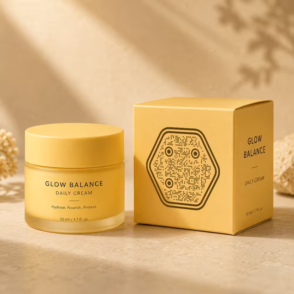 A yellow skincare jar beside its box, which carries a hexagonal QR code