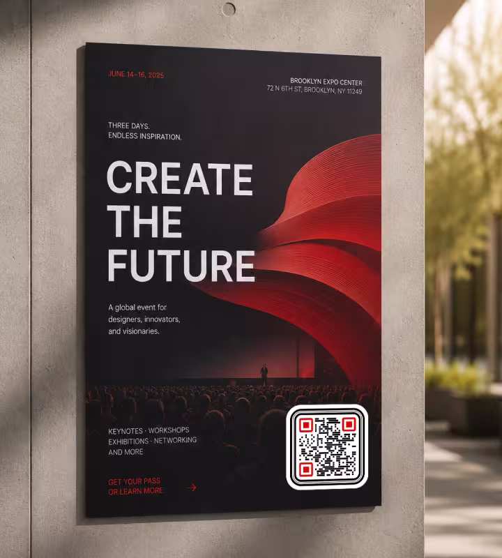 An event poster on a wall reading “Create the Future” with a QR code in the corner