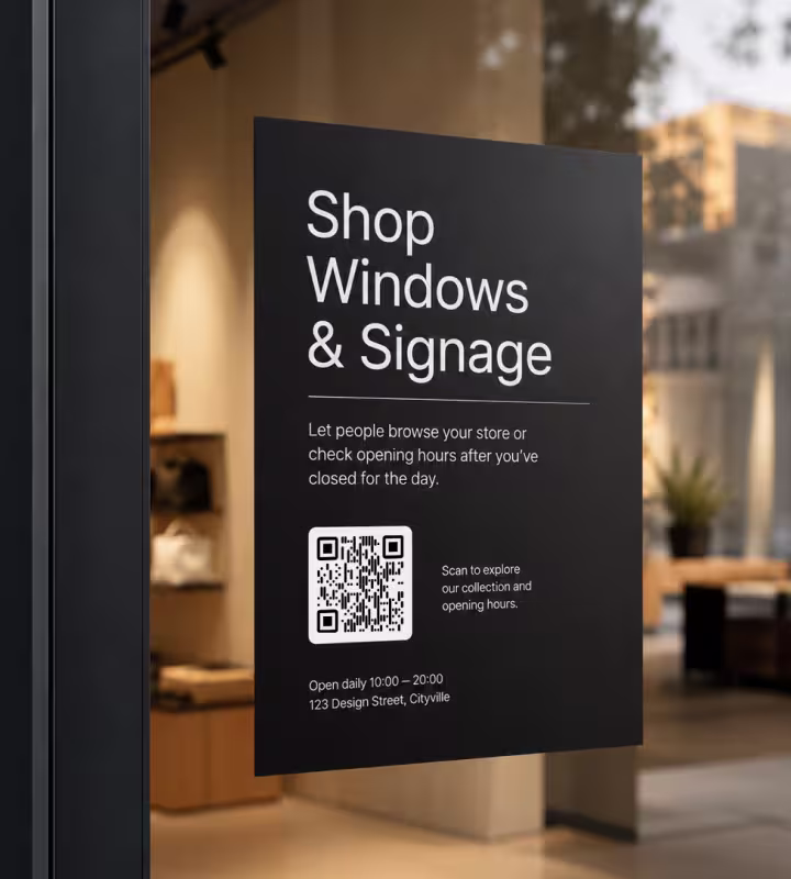 A dark shop window sign with a QR code and opening hours after the store has closed